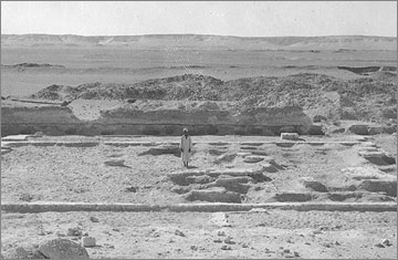 Excavation photograph (1932) of the rear part of the Sanctuary of the Great Aten Temple, viewed towards the east and showing the remains of the gypsum foundation layer.