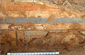 Painted wall-plaster from a dado still preserved behind a bank of sand (temporarily removed in 1993)