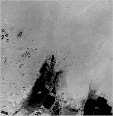 Aerial photograph taken in 1923, before the extension of agriculture, showing Kom el-Nana as an isolated desert site