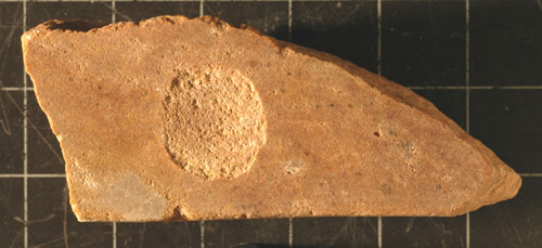Figure 1. The remains of a hammer blow on S-6681.	
