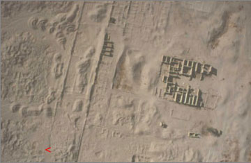 The North City: area behind the North Dig House (top right-hand corner). The red arrow marks the location of the ‘North House Dump’ of stone fragments. North is to the bottom of the image.