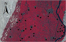Satellite image of the survey area. The red areas represent archaeological places of interest and the circles mark the locations of the sites surveyed in the 2004 season. 